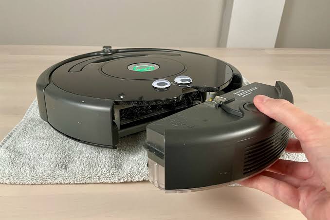 Reinstall the roomba bin after emptying